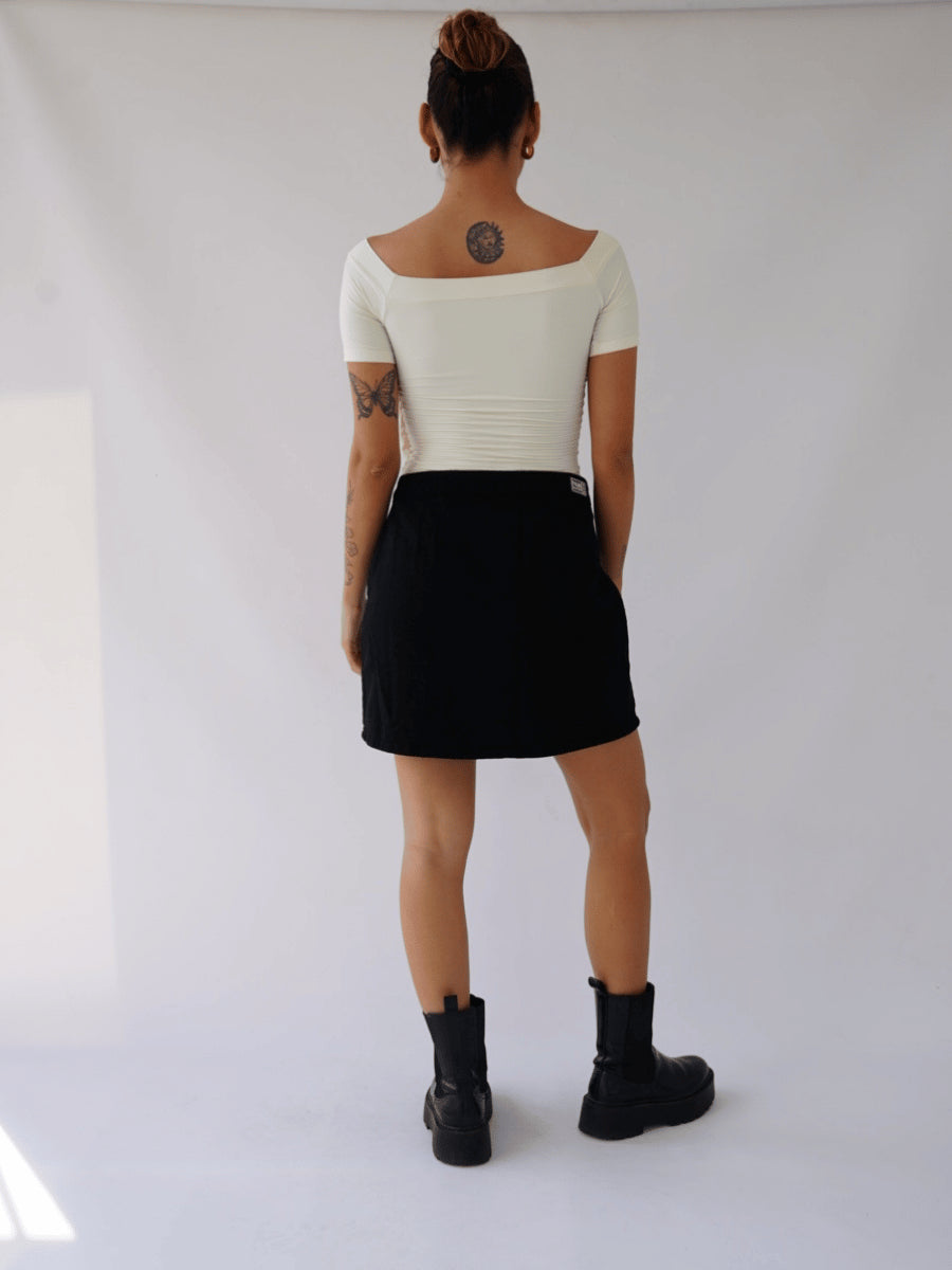 Falda Botón Lateral Tono Negro